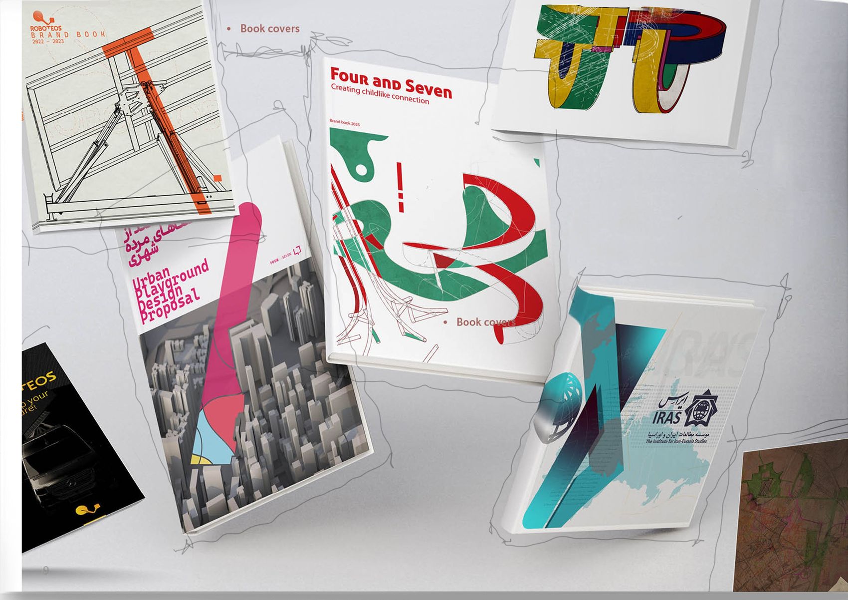 A set of printed covers including the Roboteos brand book, a playground design proposal and an institute publication.